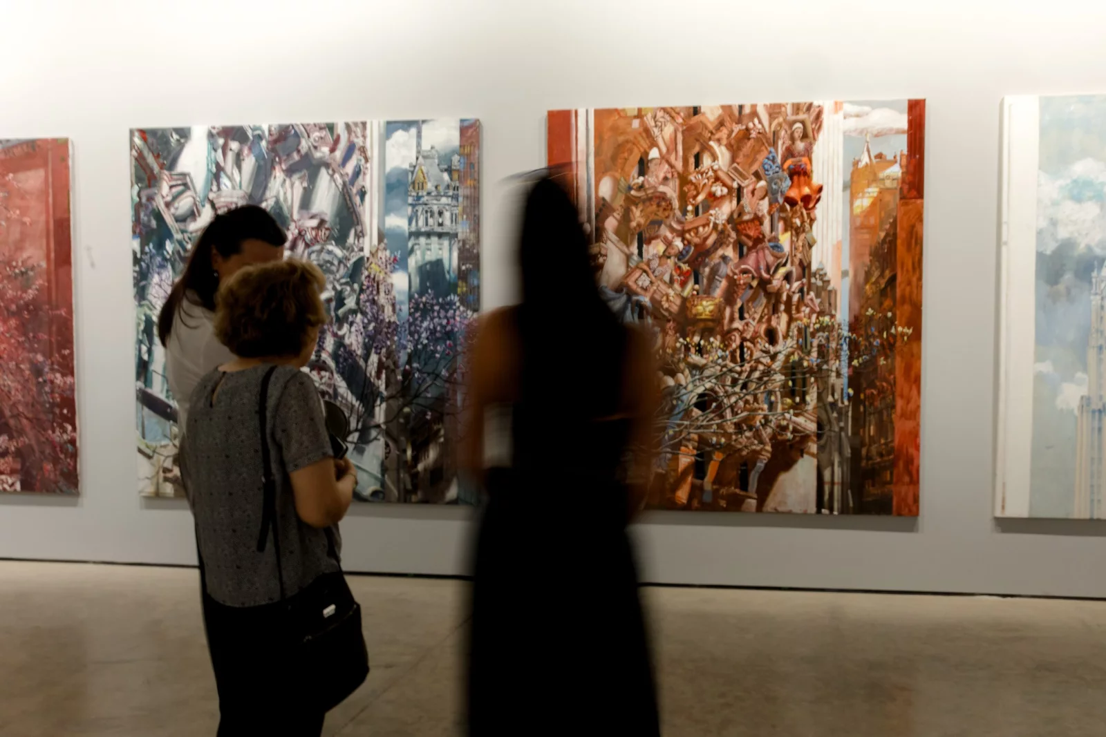 Visitors exploring an exhibition at GOCAT